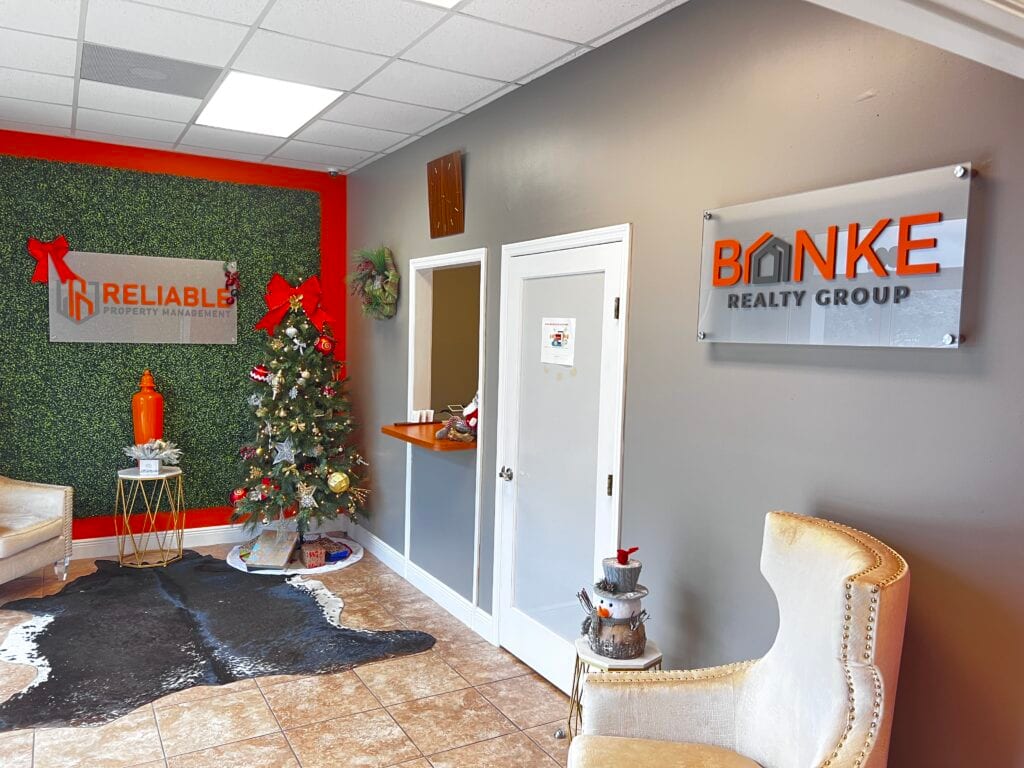 3d acrylic stand off sign with raised acrylic letters and frosted backing for real estate company