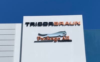Custom signs displayed at a local and national business, emphasizing their power to attract customers and boost visibility.
